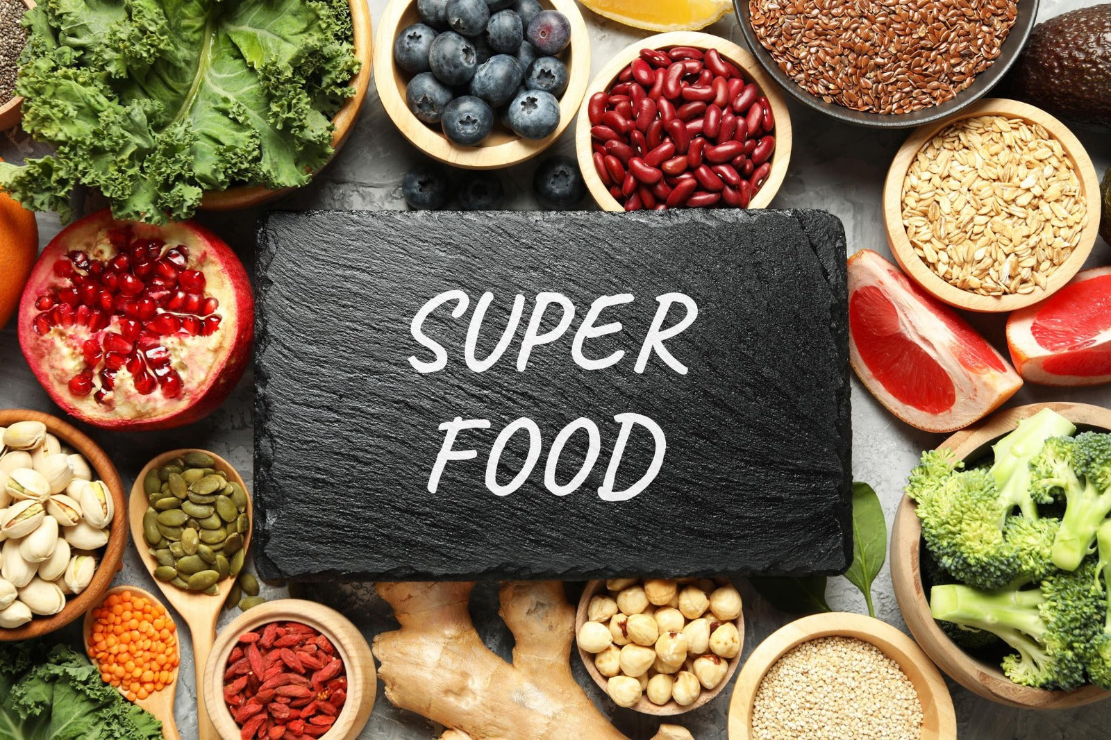 Anti-aging foods for skin including berries, avocado, salmon, leafy greens, and hydration supporting the skin barrier and microbiome.