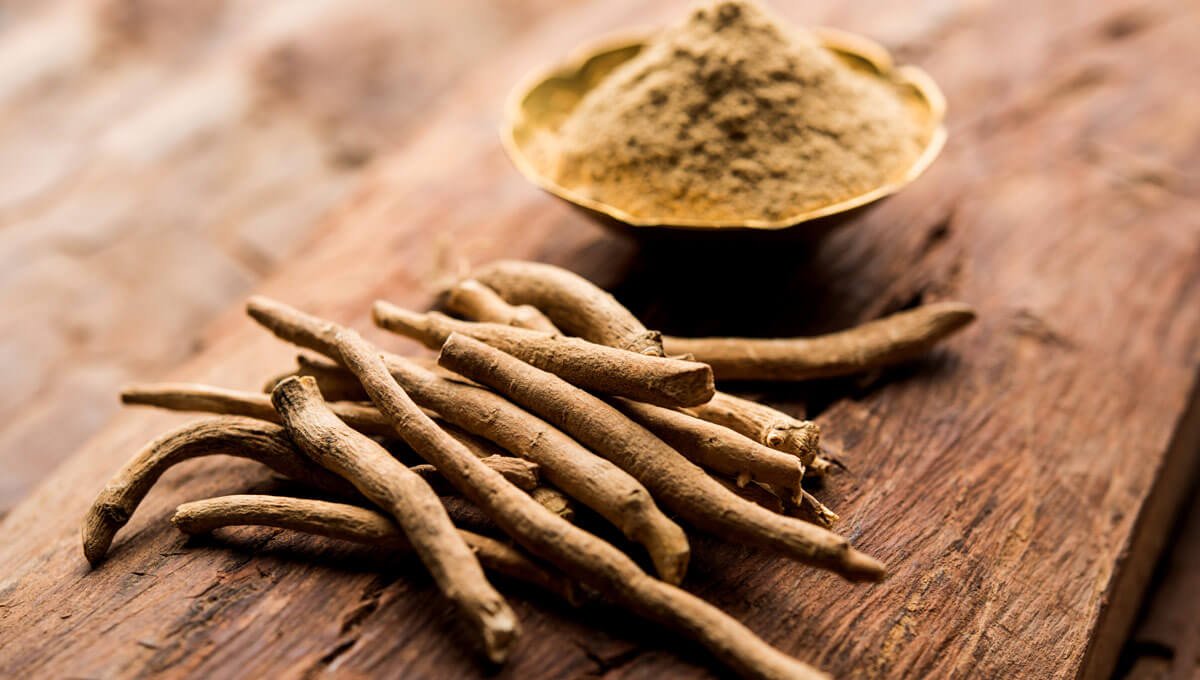 Ashwagandha root and skincare products for glowing, healthy skin
