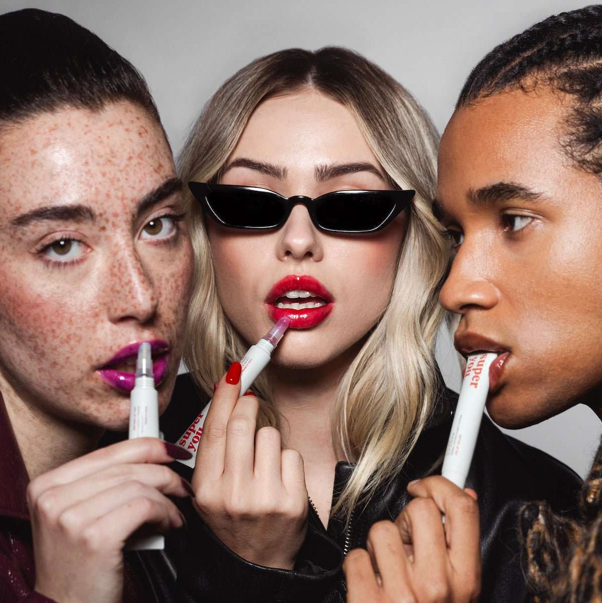 SuperYou Lip Tints in natural shades on a minimal background, ideal for soft, hydrated, and colorful lips.